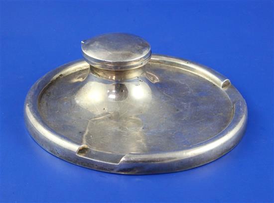 A George V silver inkstand, weighted.